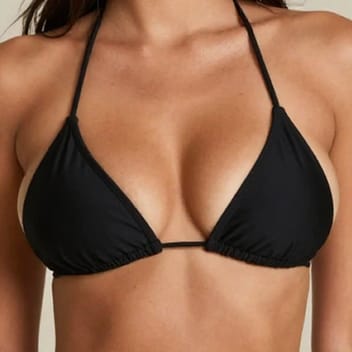 A pair of nude average-sized breasts.